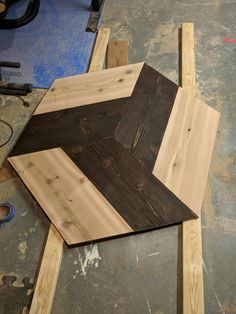 some pieces of wood are laying on the floor