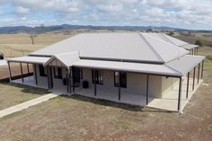 an aerial view of a house in the middle of nowhere