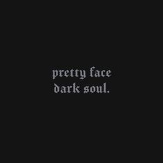 the words pretty face dark soul written in white ink on a black background with an image of