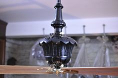 the ceiling fan is hanging from the ceiling