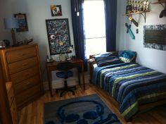 the bedroom is clean and ready to be used for someone's dorm or work space