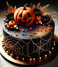 a halloween cake decorated with pumpkins and spider web