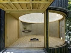 the inside of a room with an open door and some lights on top of it