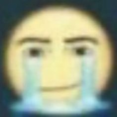 a blurry image of a man's face with water coming out of his eyes