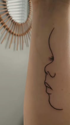 a woman's face is shown on the side of her neck