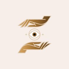 two hands holding an eye in the middle of each other's fingers, with gold foil