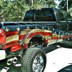 a truck with an american flag painted on it