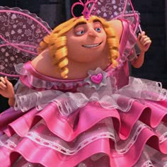 a close up of a doll wearing a pink dress