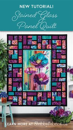 a colorful quilt with flowers on it and the words, new floral stained glass panel quilt