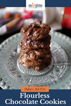 three chocolate cookies stacked on top of each other with the words, flourless chocolate cookies