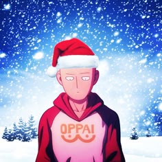 a man wearing a santa hat standing in the snow