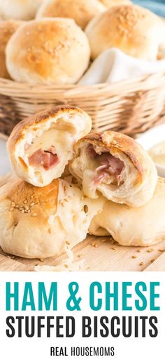ham and cheese stuffed biscuits on a cutting board with text overlay that reads ham and cheese stuffed biscuits