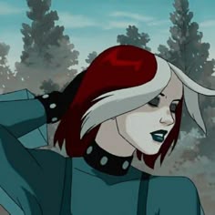 a woman with red hair is standing in the woods