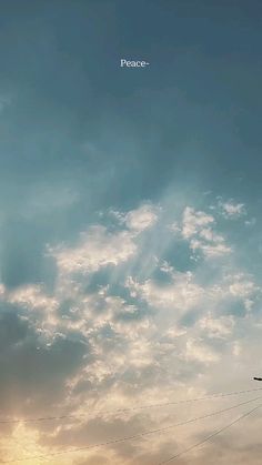 an airplane is flying high in the sky