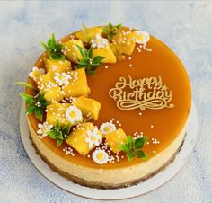 Mango Cheesecake With Garnish, Mango Cheesecake With Mint Garnish, Mango Cheesecake Recipe Card, Birthday Cake With Mango Topping, Japanese Mango Cheesecake, Mango Cheesecake With Rose Design, Colorful Mango Cheesecake, Mango Cheesecake With Flowers, Mango Cheesecake Decoration