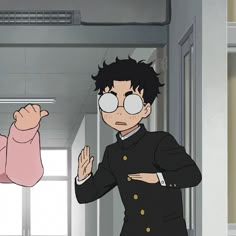 an animated image of a man and woman standing next to each other in a hallway