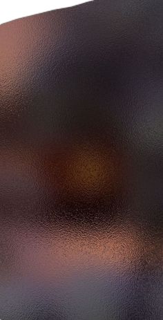 a close up view of an orange and black object