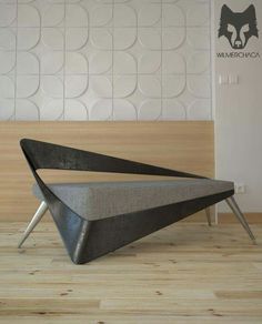 a modern daybed made out of concrete and metal