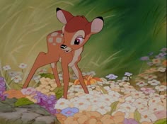 the little deer is standing among flowers and plants in this animated scene from disney's the princess and the frog
