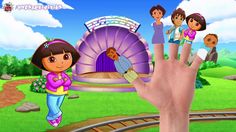 a hand with an image of dora the explorer on it and some people standing around