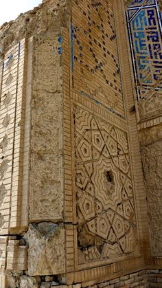 an old building with intricate designs on it