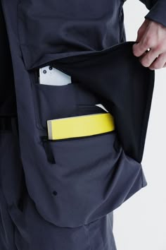 Functional Outerwear With Pockets, Functional Windbreaker With Pockets, Functional Outerwear With Cargo Pockets For Streetwear, Functional Streetwear Outerwear With Multiple Pockets, Nylon Outerwear With Functional Pockets For Streetwear, Urban Outerwear With Functional Pockets, Functional Streetwear Outerwear With Patch Pockets, Functional Travel Outerwear With Multiple Pockets, Hidden Pockets