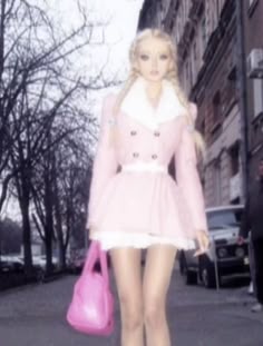 a barbie doll is walking down the street with a pink handbag in her hand
