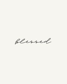 the word blessing written in cursive handwriting on a white background with black ink