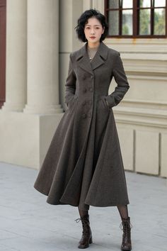 Expertly crafted for ultimate warmth and style, our Maxi warm double breasted winter wool coat is the perfect addition to your cold weather wardrobe. Made from premium quality wool, this coat features a double breasted design and a maxi length for added coverage. Stay cozy and chic all winter long with this must-have coat. Feminine Winter Coats, Brown Double-breasted Wool Coat For Winter, Vintage Brown Wool Coat For Winter, Fitted Long Wool Coat In Vintage Style, Vintage Single-breasted Wool Coat For Winter, Winter Brown Double-breasted Wool Coat, Chesterfield Coat Women, Elegant Brown Wool Coat With Button Closure, Vintage Brown Long Wool Coat