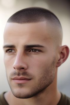 If you have a diamond face shape, a buzz cut with faded sides could be the perfect match for you. The faded sides make the cut pop while the top retains its classic buzz cut appeal. Click here to check out more best buzz cut hairstyles for men right now. Best Buzz Cut, Buzz Haircut Men, Buzz Cut With Shape Up, Good Looking Buzz Cuts, Short Buzz Cut Men, Buzz Cut Mens, Buzz Cut Options, Men Buzz Cut, Buzz Cut Mens Men's Hairstyle