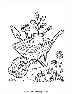 a wheel barrow with gardening tools in it