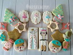 decorated cookies are laid out on a table