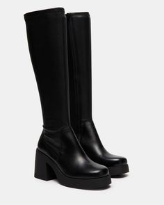 The BERKLEIGH square toe knee boot gives you a sleek and defined silhouette with a stretch fabric construction and platform sole with a block heel. Square toe platform block heel knee boot Side zipper closure 3.25 inch heel height 1 inch platform Size 6 measurements: 13.39 inch top-shaft circumference, 11.9 inch mid-shaft circumference, 15 inch shaft height Size 8 measurements: 14.17 inch top-shaft circumference, 12.3 inch mid-shaft circumference, 16 inch shaft height Size 10 measurements: 14.96 