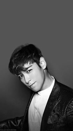 black and white photograph of a young man in a suit