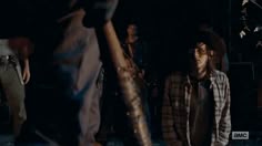 a group of young men standing next to each other