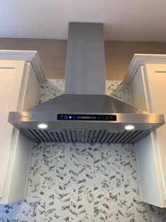 There's no need to spend close to a grand plus for a modern & powerful range hood.  This 900 CFM (Cubic Foot per Minute) range hood provides nearly professional kitchen grade ventilation for less than 400 dollars with an active discount.  It's highly rated by buyers, easy to install, and comes with a remote and touch-less control (turn on/off with a wave of hand) as bonus features!