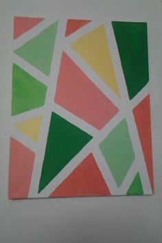 an abstract painting with different colors and shapes on white paper in the shape of triangles