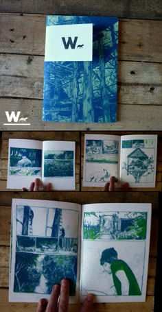 someone is holding an open book in their hand and it has drawings on the pages