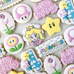 some decorated cookies are sitting on a table