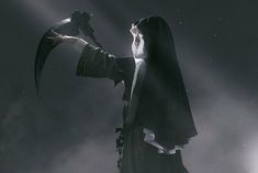 a man dressed in black and white holding a sceptula on his left hand