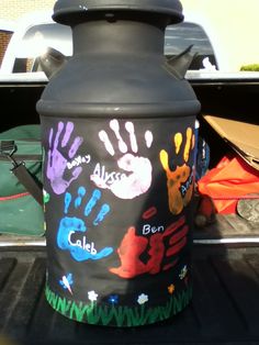 the back end of a truck with hand prints painted on it