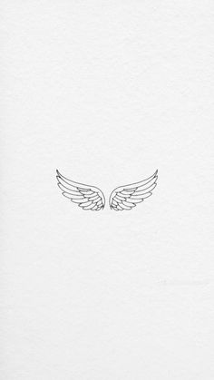 a drawing of two wings on white paper