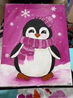 a painting of a penguin wearing a hat and scarf with snowflakes on it