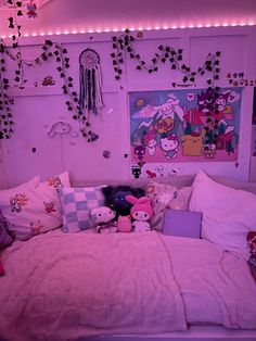 a bed with many stuffed animals on it in a room decorated with lights and decorations