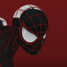 a spider - man is standing in front of a red background