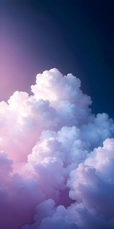 the sky is filled with white clouds and pink hues, as well as blue