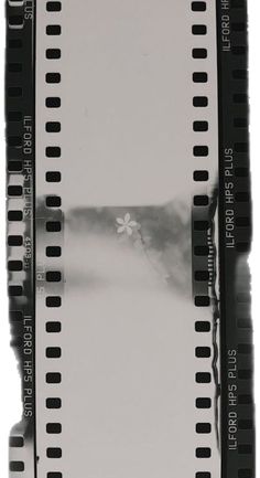 an old film strip with some black and white filmstrips on the bottom half