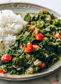 a plate with rice and spinach on it