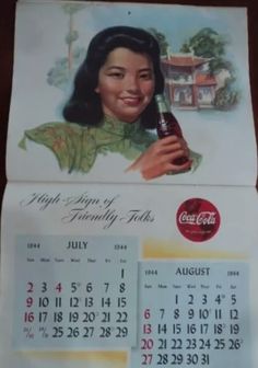 a calendar with an image of a woman holding a beer
