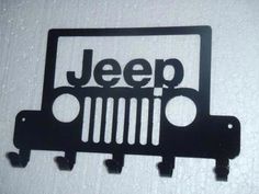 jeep emblem on the side of a white wall